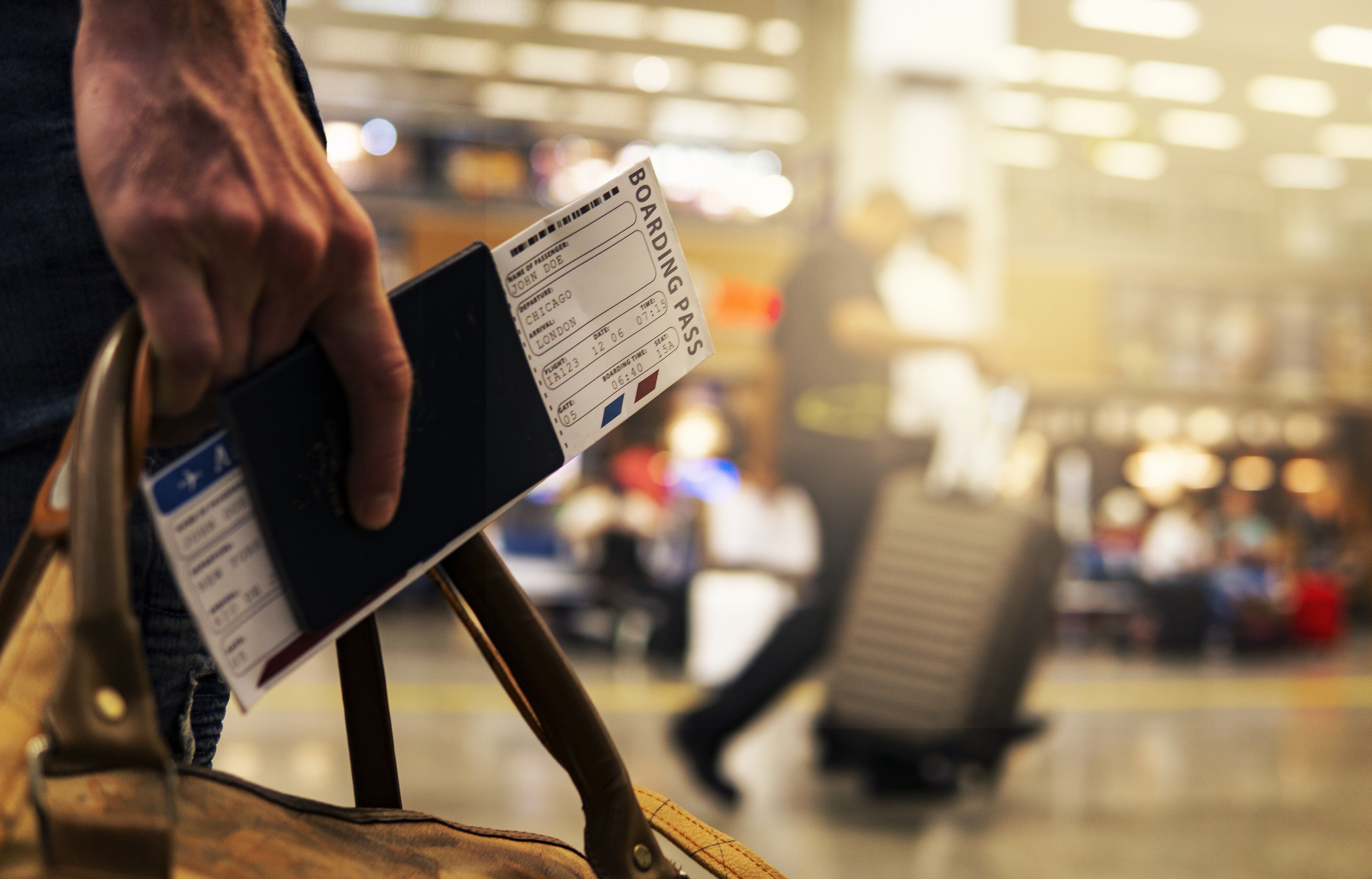 Businessman at airport — work from anywhere